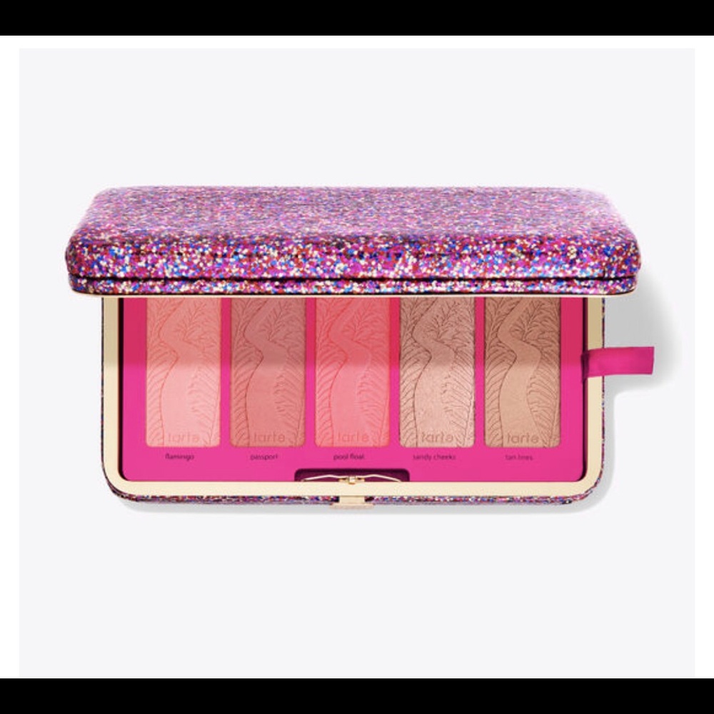 New in box Tarte Blush Clutch